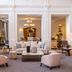 Grand Hotel Des Bains Kempinski in St. Moritz lounge with seating area and chandeliers