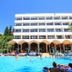 Kayamaris Hotel Marmaris: outdoor pool with sun loungers and white arched balconies