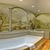 The Welcombe Hotel, Stratford-upon-Avon: bathroom with a freestanding tub and safari mural wall art