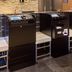 Comfort Hotel Tomakomai lobby with self-check-in kiosks and luggage storage shelves