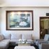 Meson Ejecutivo Guadalajara lobby seating area with sectional sofa, chairs, and framed floral artwork