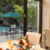 Riversong Guest House Cape Town dining area overlooking garden patio and pool