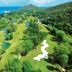 Constance Lemuria, Grand'Anse Praslin: aerial view of golf course, lush hills and turquoise ocean