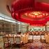 Power Valley International Hotel in Baoding dining room with red chandelier and round banquet tables