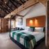 The Henry Jones Art Hotel Hobart room with vaulted timber ceiling, harbor view and king bed