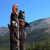 Sunwapta Falls Rocky Mountain Lodge in Jasper with mountain views and a carved totem pole