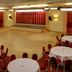 Best Western Aberavon Beach Hotel in Port Talbot conference hall with round tables and a stage