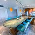Resort Harbour Properties in Fort Myers, open kitchen with granite island and turquoise barstools