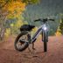 Hotel Saltenhof in Hoerstel with an electric bike on a forest trail amid autumn trees