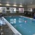 Country Inn & Suites by Radisson, Hagerstown, MD indoor pool with hot tub seating area