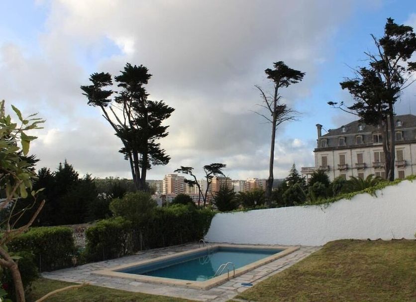Boutique Inn & Restaurant - Casa dos Suécos in Figueira da Foz with outdoor pool and garden view
