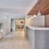 Mavrikos Hotel in Tsilivi lobby with reception desk, potted plants and modern wood-slat ceiling