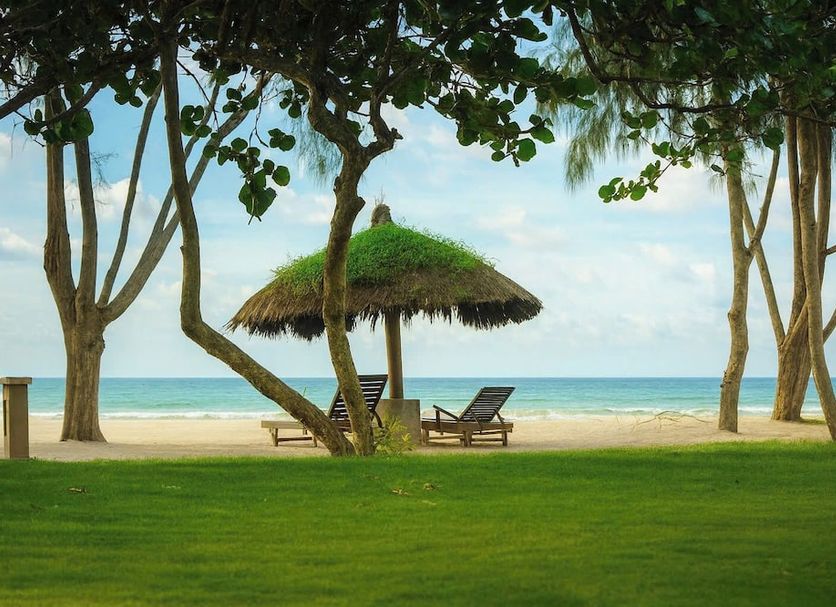 Ho Tram Beach Boutique Resort & Spa in Ba Ria: beachside hut, lounge chairs and ocean view