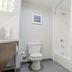Bathroom at Hampton Inn Santa Clarita-Valencia in Santa Clarita with toilet, sink, and shower-tub combo