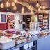 ibis Styles Toulouse-Blagnac Aéroport breakfast buffet with pastries, cereal, coffee station and hanging lights