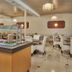 Mavrikos Hotel in Tsilivi dining room with buffet counter and white tables and chairs