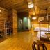 Home++ Xi'an in Xi'an: wood-paneled room with bunk beds, desk and ladder