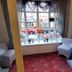 Novello Blackpool room with bay window seating and street view in Blackpool