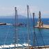 Ambassadors Residence Boutique Hotel in Chania with harbor masts, breakwater lighthouse and sea views