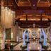 Hilton Qingdao Golden Beach lobby with chandeliers, marble columns and illuminated blue sculptures
