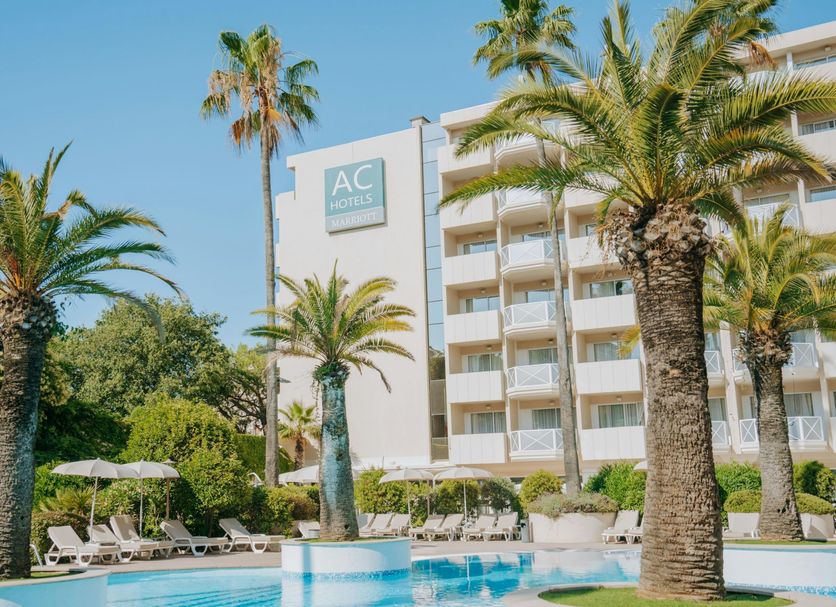 Pool and palm trees at AC Hotels by Marriott Ambassadeur Antibes- Juan les Pins in Antibes
