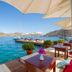 Baldan Suites Hotel & Restaurant in Bozburun with seaside terrace tables and clear blue bay views