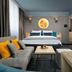 Leonardo Boutique Hotel Krakow Old Town room with sofa, king bed and wall-mounted TV in Krakow