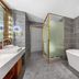 James Joyce Coffetel Hotel Qinhuangdao bathroom with freestanding tub, walk-in shower and vanity