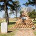 Comfort Suites Lawton Near Fort Sill in Lawton, outdoor stone memorial with eagle statue and gravestones