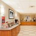 Hampton Inn and Suites Jamestown breakfast area with buffet tables and checkered tile floor
