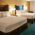 Fairfield Inn & Suites by Marriott Colorado Springs North/Air Force Academy guest room with two beds and window