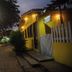 Pousada Velha Boipeba in Velha Boipeba, lit exterior along a cobblestone street at night