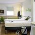 Ibis Budget Barcelona Sant Andreu de la Barca room with twin beds and a small desk