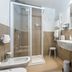Hotel Ca' Nobile Corner bathroom in Venice with shower, bidet, sink and beige tile