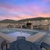 Best Western Timberridge Inn in Grove with outdoor pool at sunset and motel-style exterior