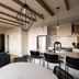 Maison Place Royale by Luxury In Transit in Montreal: open-plan suite with kitchen island and dining area