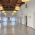 Hotel Villa Policreti in Aviano event hall with high wooden ceiling and polished floor