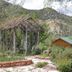 Historic Smith Hotel B&B in Glendale with a garden pergola, fire pit, and mountain backdrop