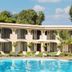 Guadalajara Plaza Ejecutivo in Guadalajara with a courtyard pool and two-story arched facade