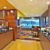 Breakfast area at Fairfield Inn & Suites by Marriott Madison West/Middleton in Middleton with seating and buffet