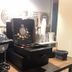 Do-Do Navona Suites in Rome coffee station with espresso machine and takeaway cups
