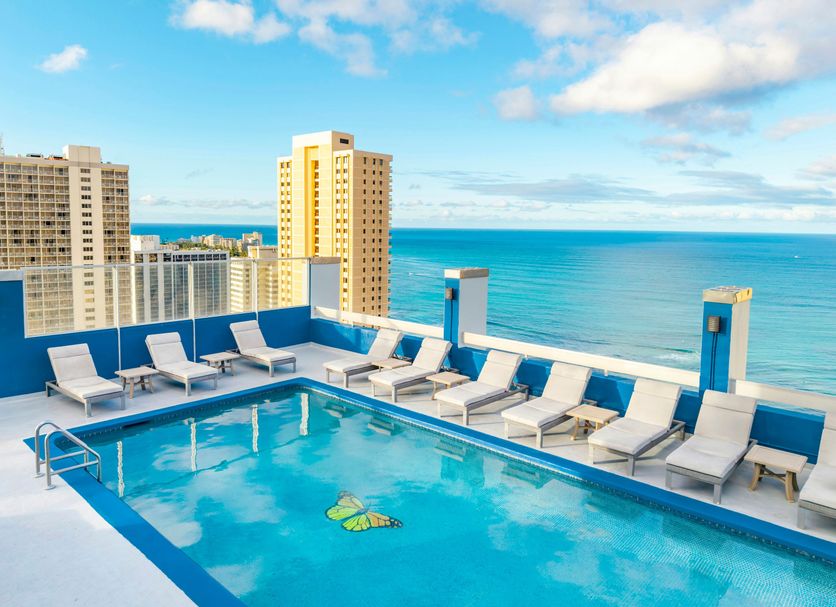 Pacific Monarch Hotel in Honolulu rooftop pool with ocean and city views