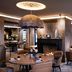 Hôtel Saint-Delis - La Maison du Peintre, Honfleur lounge with fireplace and round dining tables