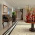 Meliá Paris Vendôme lobby with floral arrangement and elegant marble flooring in Paris