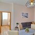 Dorf.Apart in Neustift im Stubaital with a cozy lounge, sectional sofa, wall TV and mountain photos