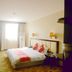Lvjing International Hotel Taizhou guest room with king bed, desk, TV and large window