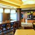 Fairfield Inn & Suites by Marriott Seymour breakfast area with tables, chairs, and buffet counter