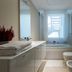Bathroom at Una Hotels Le Terrazze Treviso Hotel & Residence in Villorba with tub, bidet and towel warmer