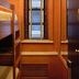 West Village Eurohostel, New York: wood-paneled hostel room with bunk beds and a window with blinds