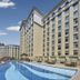 Haili Garden Hotel Guangzhou rooftop pool with curved lap lanes and city skyline